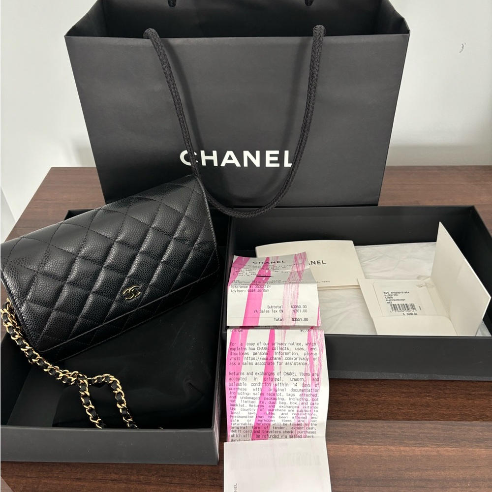 Chanel wallet on chain . Lambskin black gold chain. 4.8x7.5x1.4 inches